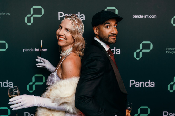 a man and a woman dressed up for a party.